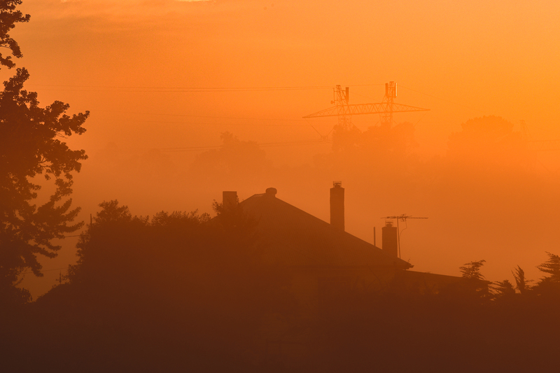 A smokey haze near a house