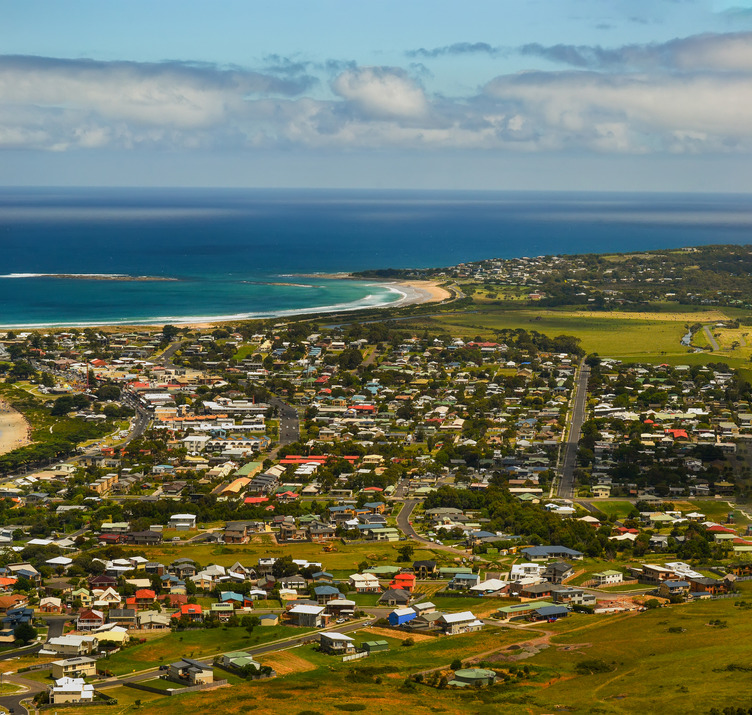 An aerial view of a coast town
