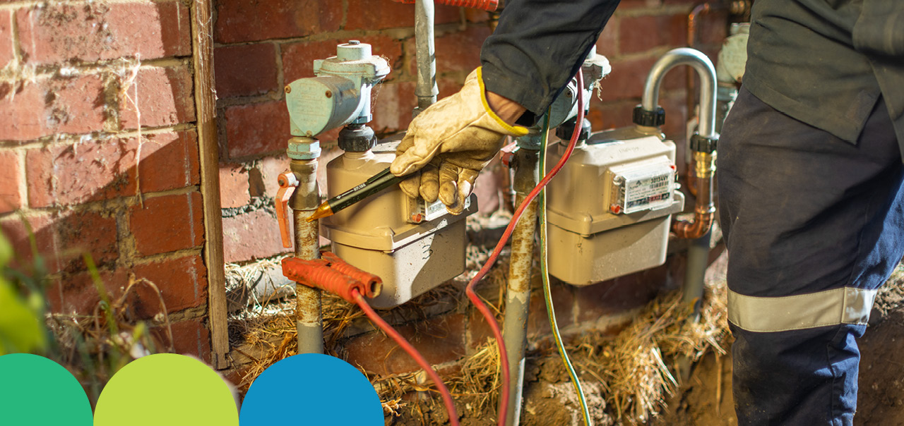 A worker testing an electricity connect
